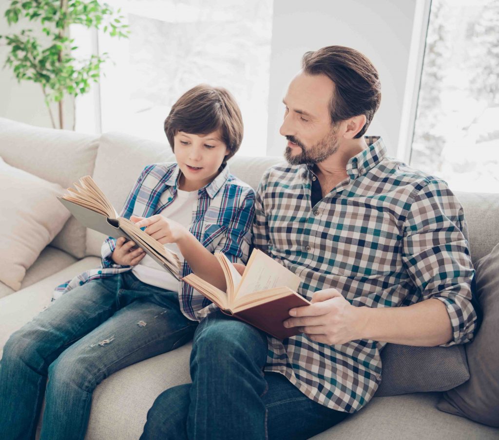 This image has an empty alt attribute; its file name is father-son-reading-different-books-1024x904.jpg