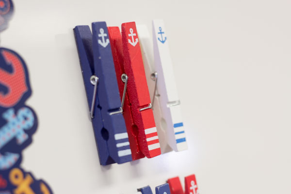 Anchors Magnetic Clothespins on a whiteboard